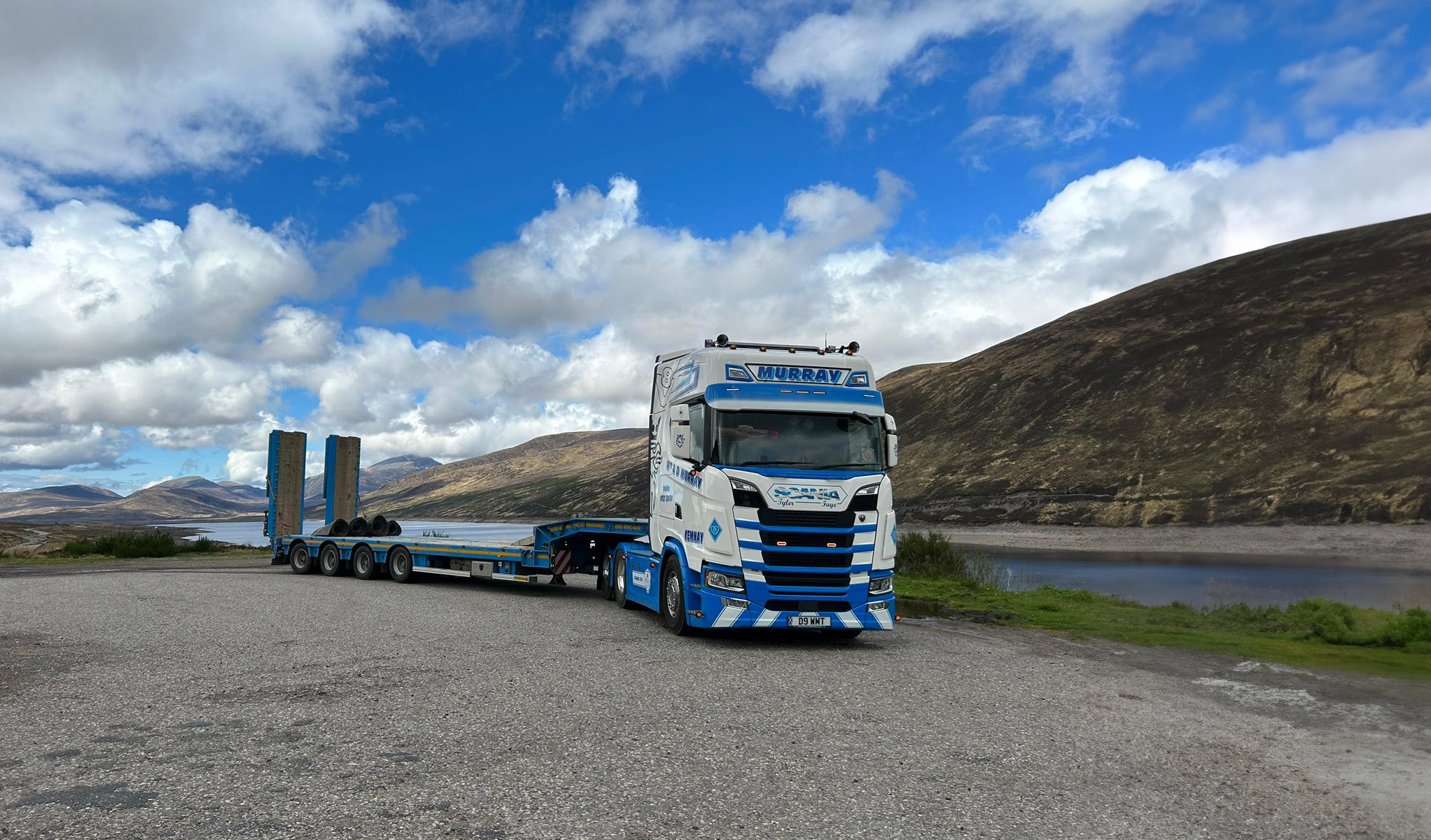 lorry beside a loch